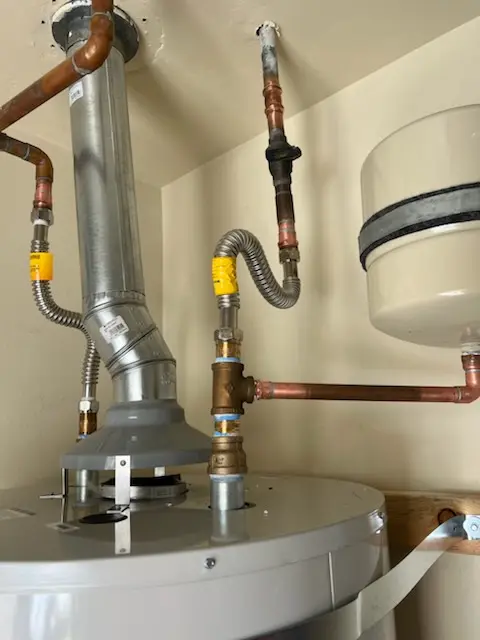 Water heater installation and plumbing repair in East Side Commercial Area